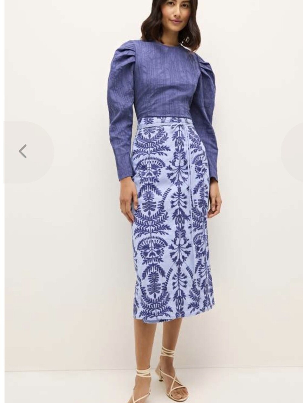 Marie Oliver The Sandra Skirt features a slimming wrap silhouette Size M